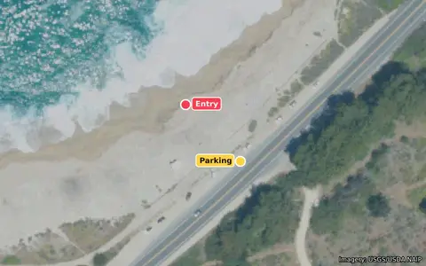 Aerial view of Monastery Beach by the Highway 1 parking with the entry and parking marked