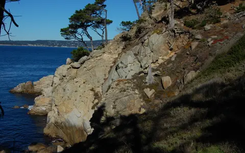 Granite cliffs and blue water at Bluefish Cove, Point Lobos